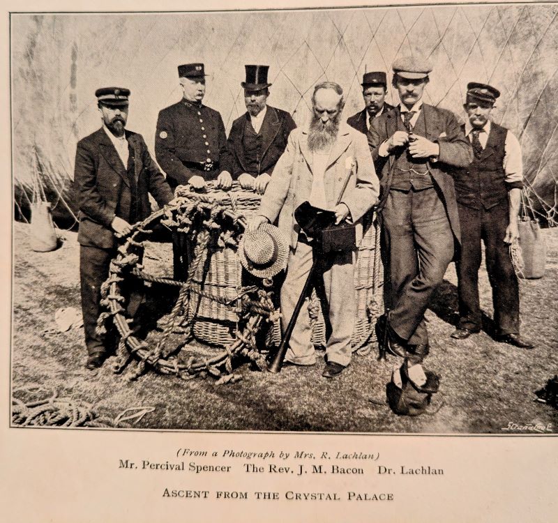 Black and white plate frontispiece showing Bacon and others leaning against balloon basket captioned 'Ascent from The Crystal Palace.'